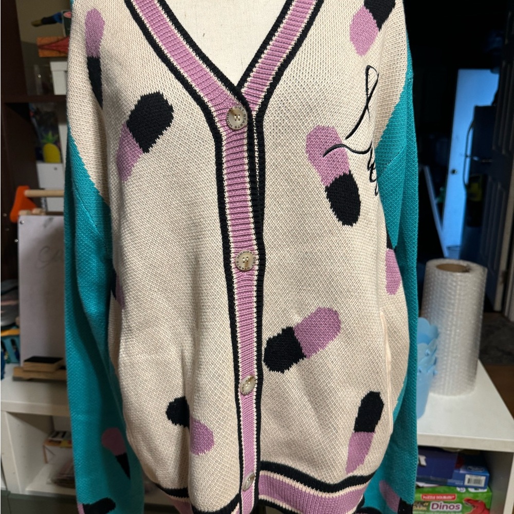 Playful Blue and Pink Cardigan with Unique Print